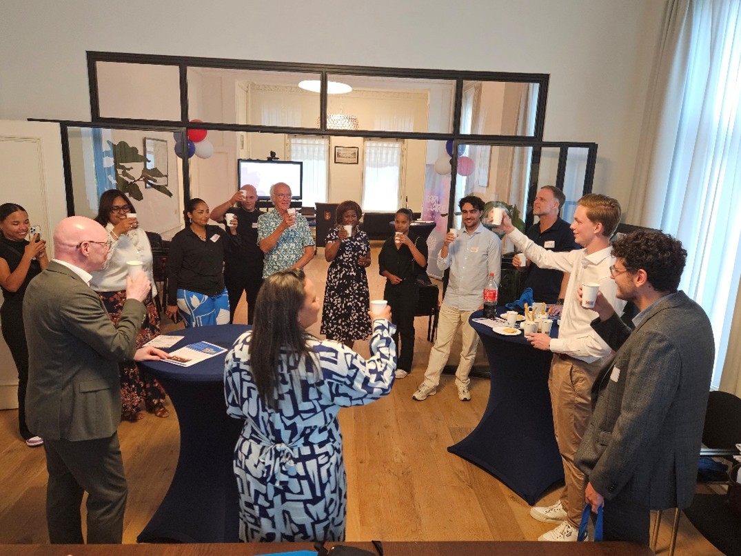 Minister Plenipotentiary Arrindell Opens Cari-Aire Goodbye Event At The Sint Maarten House In The Hague 160 Minplen Cari Aire Pix3 A Toast